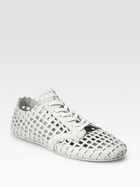 Sporty, modern lace-up design in woven leather.Leather liningPadded insoleRubber soleImported Sporty, modern lace-up design in woven leather.Leather liningPadded insoleRubber soleImported