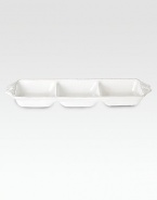 Tidy, lovely, and sublimely useful to keep on hand for anytime-entertaining, finished with scalloped handles and a threaded edge.Ceramic stoneware2H X 15½L X 5WDishwasher- & microwave-safeImported