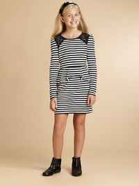 Touches of lace adorn the shoulders of this sweet striped jersey with ruffly peplum waist.Round necklineLace details at shouldersLong sleevesPleated peplum waistKeyhole button backCottonMachine washImported Touches of lace adorn the shoulders of this sweet striped jersey with ruffly peplum waist.Round necklineLace details at shouldersLong sleevesPleated peplum waistKeyhole button backCottonMachine washImported