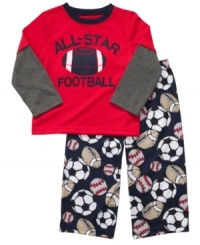 Sports star. He can dream of the big game with this sleepwear set from Carter's, with a layered tee and cozy pajama pants. Sports star. He can dream of the big game with this sleepwear set from Carter's, with a layered tee and cozy pajama pants.