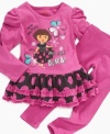 She can go explorin' with the sweet, cuddly style of this Dora tutu dress and leggings from Nannette.