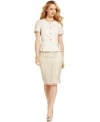 Feminine touches, like a beautiful lace detail and peplum jacket hem, give this skirt suit from Tahari by ASL a romantic feel.