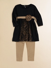 A pretty set that pairs a rosette and lace accented tunic with metallic leggings for a glamorous look. Tunic ScoopneckThree-quarter length sleevesPull-on styleContrast waistband with rosetteLace panel71% polyester/24% rayon/5% spandex Leggings Elastic waistband57% cotton/38% polyester/5% spandexMachine washImported A pretty set that pairs a rosette and lace accented tunic with metallic leggings for a glamorous look. Tunic ScoopneckThree-quarter length sleevesPull-on styleContrast waistband with rosetteLace panel71% polyester/24% rayon/5% spandex Leggings Elastic waistband57% cotton/38% polyester/5% spandexMachine washImported