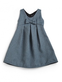 THE LOOKSleevelessBow detail at frontEmpire waistPleated details, front and backBack button closureA-line silhouetteTHE MATERIALPolyesterFully linedCARE & ORIGINDry cleanImported THE LOOKSleevelessBow detail at frontEmpire waistPleated details, front and backBack button closureA-line silhouetteTHE MATERIALPolyesterFully linedCARE & ORIGINDry cleanImported