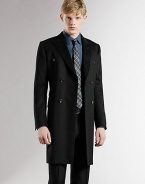 A classic wool topcoat features a double-breasted front and signature GG lining. Double-breasted buttonfront Three waist flap pockets Signatur elining About 34½ from shoulder to hem Wool Dry clean Made in Italy 