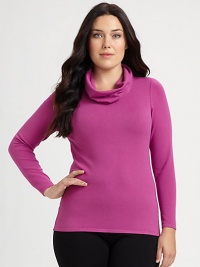 Decidedly more feminine than the sartorial classic, a soft jersey pullover with a draped turtleneck.Draped turtleneckLong sleevesPull-on styleAbout 24 from shoulder to hemViscose/polyesterDry cleanMade in Italy Decidedly more feminine than the sartorial classic, a soft jersey pullover with a draped turtleneck.Draped turtleneckLong sleevesPull-on styleAbout 24 from shoulder to hemViscose/polyesterDry cleanMade in Italy