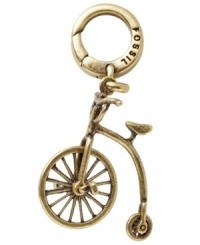 Traditional style for the vintage-loving lady. Fossil's antique-inspired bicycle charm features a towering three-wheel design in oxidized brass tone mixed metal. What's more, the wheels actually work! Approximate drop: 1 inch. Traditional style for the vintage-loving lady. Fossil's antique-inspired bicycle charm features a towering three-wheel design in oxidized brass tone mixed metal. What's more, the wheels actually work! Approximate drop: 1 inch.
