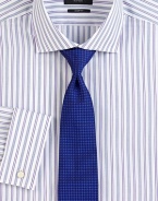 A clean, modern fit in fine cotton shirting with French cuffs and purple/blue stripes. ButtonfrontSharp fitModified point collarFrench cuffsCottonDry cleanImported