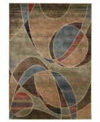 An abstract beauty in bold, blended color. Rich in artful expression, this Nourison rug is made with exclusive, premium-quality Opulon™ yarns to create a densely woven and strikingly luxurious pile that provides years of fade-free style. Hand-carved details add textural interest.