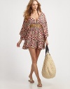 A dramatic style with kimono sleeves, beaded waistline and a tie plunge v-back. V-neckThree-quarter length kimono sleevesTie v-backBeaded empire waistGathered skirtRayonDry cleanImported 