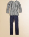 A cozy cotton knit is given a deconstructed update with cutout designs.BoatneckLong sleevesPullover styleCottonMachine washImported