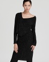 Putting a modern spin on timeless tweed, this Donna Karan New York tunic, with a cowl neck that drapes ever so slightly off the shoulder, can be worn solo or over leggings and tights as the weather cools. Work or weekend, it's ever so cool belted with knee-high boots.