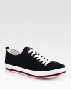 Striped thick sole sets the tone for this charming, casual staple rendered in rich suede.Suede upperRubber soleImported