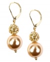 The warm tones of topaz and gold add a look of intrigue to these glass pearls and pave crystal balls. AK Anne Klein's leverback earrings are crafted in gold tone mixed metal. Approximate drop: 1 inches.