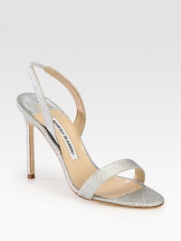 Strappy closet staple with a slender heel, impeccably-crafted of glitter-coated fabric. Self-covered heel, 4 (100mm)Glitter-coated fabric upperLeather lining and solePadded insoleMade in ItalyOUR FIT MODEL RECOMMENDS ordering true size. Strappy closet staple with a slender heel, impeccably-crafted of glitter-coated fabric. Self-covered heel, 4 (100mm)Glitter-coated fabric upperLeather lining and solePadded insoleMade in ItalyOUR FIT MODEL RECOMMENDS ordering true size.