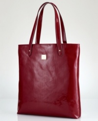 Shoulder some signature style with this sleek silhouette by Lauren Ralph Lauren, featuring logo-embossed patent leather and luxe golden hardware. Perfectly poised for toting laptop, eReader and favorite periodicals. Shoulder some signature style with this sleek silhouette by Lauren Ralph Lauren, featuring logo-embossed patent leather and luxe golden hardware. Perfectly poised for toting laptop, eReader and favorite periodicals.