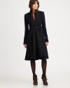 Guaranteed to turn heads, this wool coat features a waist-defining belt and flattering fit.Belted styleLong sleevesFlap pocketsBack ventFully linedAbout 40 from shoulder to hemWoolDry cleanMade in Italy of imported fabric Model shown is 5'9½ (176cm) wearing US size 4. 
