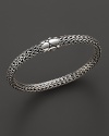 Small sterling woven chain bracelet with Kali motif clasp, designed by John Hardy.
