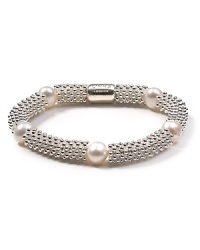 Make a bubbly statement with this sterling silver and pearl bracelet from Links of London. A cool option come party time, this bauble lends a shot of sparkle to your favorite cocktail mini. Make a bubbly statement with this sterling silver and pearl bracelet from Links of London. A cool option come party time, this bauble lends a shot of sparkle to your favorite cocktail mini.