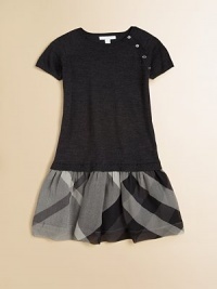Crafted in cozy, toasty wool in a drop-waist silhouette with classic checks and shoulder button detail.CrewneckShort sleevesPullover styleDrop-waistWoolDry cleanImported Crafted in cozy, toasty wool in a drop-waist silhouette with classic checks and shoulder button detail.CrewneckShort sleevesPullover styleDrop-waistWoolDry cleanImported