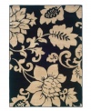 Modern luxe. Bold stencils of cream florals cascade over a stark black ground for a sophisticated design with a hint of feminine allure. The Yorkville area rug features a low pile height and soft hand for a fresh finish to any room. (Clearance)