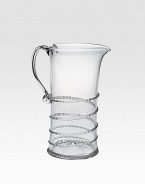 Crystal clear, mouthblown glass is beautifully detailed with dimensional threading around the pitcher. An absolute stunner to accompany dinner, drinks or a party. 60-ounce capacity 9½ high Hand wash Imported