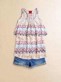 A colorful zig-zag print and v-shaped, layered look waist add a zing to this knit tunic.ScoopneckSleeveless racerbackLayered-look waistRounded hemRayonHand washImported A colorful zig-zag print and v-shaped, layered look waist add a zing to this knit tunic.ScoopneckSleeveless racerbackLayered-look waistRounded hemRayonHand washImported