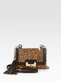 Beautiful leopard print hair calf with supple leather trim, perfect for all your essentials.Detachable leather and chain shoulder strap, 23½ dropTurnlock flap closureDetachable tassel accentOne outside open pocketOne inside zip pocketFully lined6¾W X 5H X 1½DImported