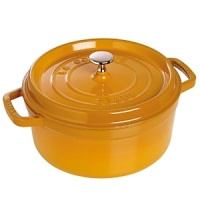 A nonstick black matte enamel interior and tight-fitting lid detailed with self-basting spikes makes Staub's cocotte ideal for creating slow-cooked, flavor-enhanced meals. Durable cast iron in a choice of dynamic hues lets each one-of-a-kind piece move easily from the oven to the table.