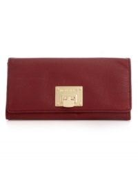 Poised and practical, MICHAEL Michael Kors brings an elegant outlook to everyday accessorizing with this rich leather carryall, featuring signature golden detailing. Ideally sized to slip inside a handbag, it boasts plenty of pockets and compartments for all the essentials. Poised and practical, MICHAEL Michael Kors brings an elegant outlook to everyday accessorizing with this rich leather carryall, featuring signature golden detailing. Ideally sized to slip inside a handbag, it boasts plenty of pockets and compartments for all the essentials.