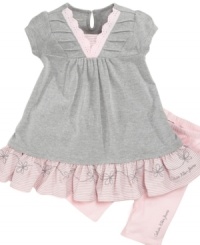That's what girls are made of. Show off her sweet side with this frilly, eyelet-detailed tunic and legging set from Calvin Klein Jeans. That's what girls are made of. Show off her sweet side with this frilly, eyelet-detailed tunic and legging set from Calvin Klein Jeans.