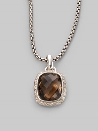 From the Noblesse Collection. An elegant faceted smokey quartz is edged in pavé diamonds and hangs on a sterling silver cable chain. Smokey quartz Diamonds, 0.3 tcw Sterling silver Chain length adjusts from about 16 to 17 Pendant width, about ½ Lobster clasp Made in USA