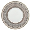 Inspired by Milleraies, Raynaud's spearhead tableware set, Attraction boasts a freer, more modern design with alternating narrow and wide stripes. It will embellish any table with its shades of pink and red, enhanced with mauve and orange and underscored subtle shades of green and brown.