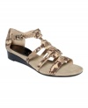 Sophisticated and chic. Ellen Tracy's Christie wedge sandals are a welcome addition to your gladiator collection.