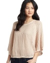 THE LOOKOpen weave designPullover styleRound necklineThree-quarter length ribbed cuff dolman sleevesRibbed circle hemTHE FITAbout 22 from shoulder to hemTHE MATERIAL55% cotton/45% acrylicCARE & ORIGINHand washImportedModel shown is 5'10 (177cm) wearing US size Small. 