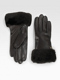 A soft, dyed shearling cuff and luxurious cashmere lining help make this leather style a cold weather essential. About 9 longSpecialist dry cleanImportedFur origin: Spain