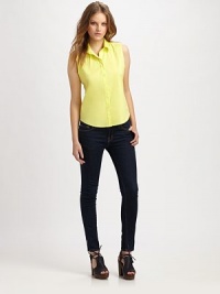The essential button-down crafted from light stretch cotton in a refreshing sleeveless silhouette. Point collarButton-down placketShirttail hemBack princess seamsAbout 22 from shoulder to hem72% cotton/23% nylon/5% Lycra®Dry cleanImported of Italian fabricModel shown is 5'8½ (174cm) wearing US size Small. The essential button-down crafted from light stretch cotton in a refreshing sleeveless silhouette. Point collarButton-down placketShirttail hemBack princess seamsAbout 22 from shoulder to hem72% cotton/23% nylon/5% Lycra®Dry cleanImported of Italian fabricModel shown is 5'8½ (174cm) wearing US size Small.