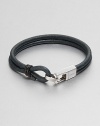 A double strand of smooth leather is accented by a sterling silver clasp.LeatherSterling silverLobster claspAbout 2½ diam.Made in the United Kingdom