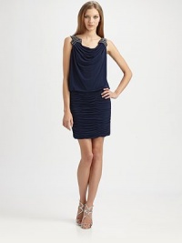 This soft jersey design features a prettily draped neckline and an allover shirred skirt.Cowl necklineBeaded shoulder detailsBlouson bodiceFitted, shirred skirtFully linedConcealed side zipAbout 18 from natural waist95% polyester/5% spandexDry cleanImportedModel shown is 5'10 (177cm) wearing US size 4. This soft jersey design features a prettily draped neckline and an allover shirred skirt.Cowl necklineBeaded shoulder detailsBlouson bodiceFitted, shirred skirtFully linedConcealed side zipAbout 18 from natural waist95% polyester/5% spandexDry cleanImportedModel shown is 5'10 (177cm) wearing US size 4.