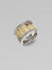 A glossy horn-printed center bordered with two sparkling bands of rhinestones and accented with logo engraved sides. AcetateGlass stonesSteelWidth, about ½Imported A glossy horn-printed center bordered with two sparkling bands of rhinestones and accented with logo engraved sides. AcetateGlass stonesSteelWidth, about ½Imported