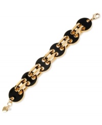 Beautiful in black. Betsey Johnson's link bracelet is crafted from gold-tone mixed metal with black glass circles making a subtle, yet refined, statement. Approximate length: 8 inches. Beautiful in black. Betsey Johnson's link bracelet is crafted from gold-tone mixed metal with black glass circles making a subtle, yet refined, statement. Approximate length: 8 inches.
