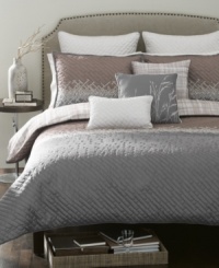 A plush landscape of embroidered blocks brings relaxing sophistication to your space in this serene Florence comforter set from Bryan Keith. Finished with a lovely mauve and gray color scheme. A plush landscape of embroidered blocks brings relaxing sophistication to your space in this serene Florence comforter set from Bryan Keith. Finished with a lovely mauve and gray color scheme.