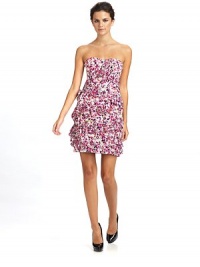 THE LOOKStrapless sweetheart necklineSeamed bodice with boningPleated ruffle embellishment Back zipper with hook-and-eyeTHE FITAbout 30 from shoulder to hemTHE MATERIAL97% cotton/3% spandexCombo: 70% cotton/30% silkSilk liningCARE & ORIGINDry clean Imported THE LOOKStrapless sweetheart necklineSeamed bodice with boningPleated ruffle embellishment Back zipper with hook-and-eyeTHE FITAbout 30 from shoulder to hemTHE MATERIAL97% cotton/3% spandexCombo: 70% cotton/30% silkSilk liningCARE & ORIGINDry clean Imported