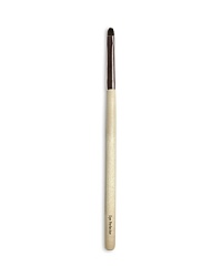 A round, closely trimmed brush designed for smudging color around the rim of the eyes. Made of luxuriously soft pony hair. A round, closely trimmed brush designed for smudging color around the rim of the eyes. Made of luxuriously soft pony hair.
