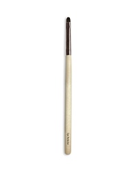 A round, closely trimmed brush designed for smudging color around the rim of the eyes. Made of luxuriously soft pony hair.