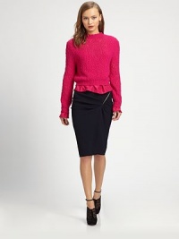 This vibrantly-hued knit pullover is embellished with silk ruffles on the cuffs and hemline.Rib-knit crewneck, cuffs and hemSilk ruffled trimBack keyhole with ribbon tie60% wool/40% polyamideDry cleanMade in FranceModel shown is 5'8 (176cm) wearing US size Small. 