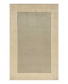 Timeless allure. This attractive area rug illuminates your home with soft grey color, offset by a refined beige-toned border. Hand-tufted and hand-carved with plush Chinese wool, the rug offers splendid softness and a deep finish that rivals the finest Tibetan weaves.