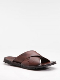 EXCLUSIVELY OURS. Laid-back style with comfort to spare: our classic criss-cross sandal is designed in burnished leather with a padded insole. Lather lining Padded insole Rubber sole Made in Italy EXCLUSIVELY OURS. Laid-back style with comfort to spare: our classic criss-cross sandal is designed in burnished leather with a padded insole. Lather lining Padded insole Rubber sole Made in Italy