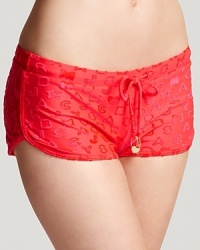 Take your label love poolside. With drawstring charms and textured detailing, MARC BY MARC JACOBS' swim shorts are an all-star anchor for your favorite suit. Take your label love poolside. With drawstring charms and textured detailing, MARC BY MARC JACOBS' swim shorts are an all-star anchor for your favorite suit.