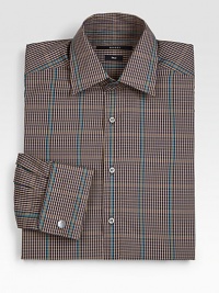 Cotton dress shirt in a fitted silhouette, modernized by this iconic check print design.ButtonfrontCottonDry cleanMade in Italy Cotton dress shirt in a fitted silhouette, modernized by this iconic check print design.ButtonfrontCottonDry cleanMade in Italy